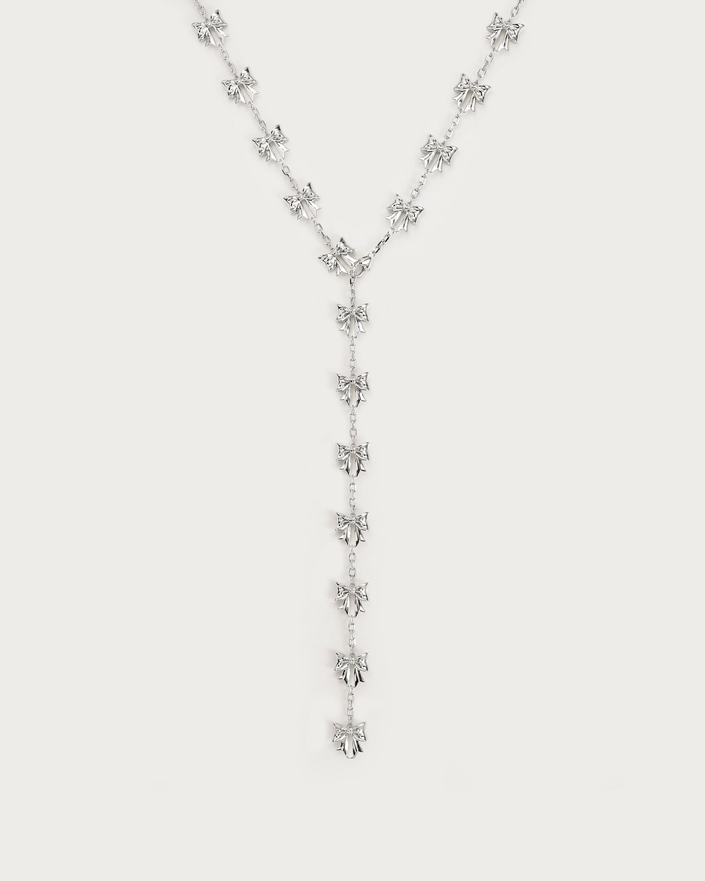 Bow Lariat Long Necklace in Silver